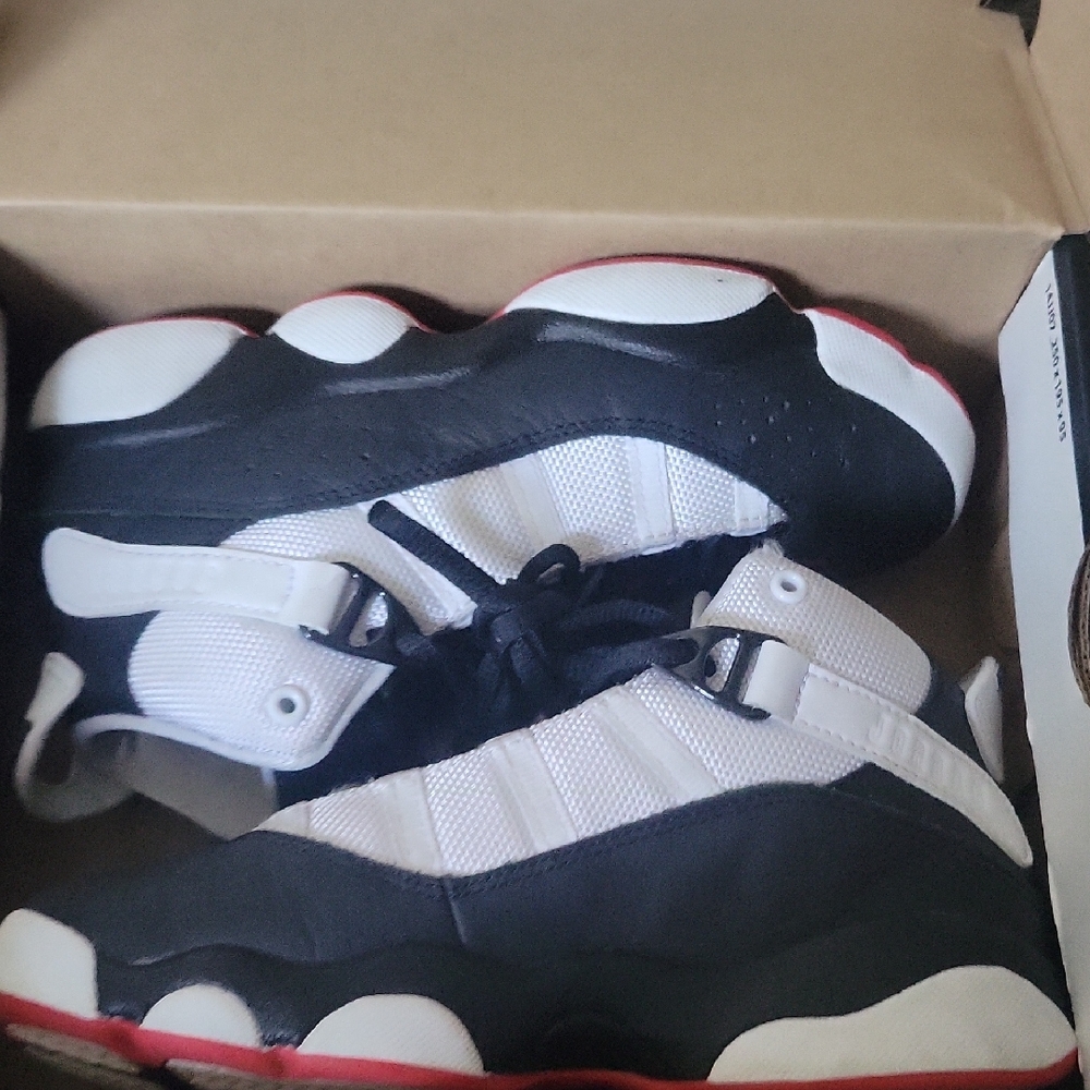 Jordan Kids Black and White Sneakers with Red Accents